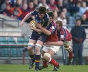 8 May 2005; Malcolm O'Kelly, Leinster, is tackled by Donnacha O'Callaghan and Paul O'Connell, Munster. Celtic Cup 2004-2005 Semi-Final, Leinster v Munster, Lansdowne Road, Dublin. Picture credit; Brendan Moran / SPORTSFILE
