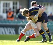 8 May 2005; Brian O'Driscoll, Leinster, is tackled by David Wallace, Munster. Celtic Cup 2004-2005 Semi-Final, Leinster v Munster, Lansdowne Road, Dublin. Picture credit; Brendan Moran / SPORTSFILE
