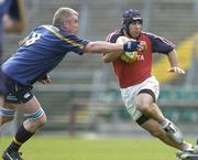 8 May 2005; Mike Mullins, Munster, is tackled by Victor Costello, Leinster. Celtic Cup 2004-2005 Semi-Final, Leinster v Munster, Lansdowne Road, Dublin. Picture credit; Brendan Moran / SPORTSFILE