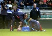 8 May 2005; John Hayes, Munster, gets treatment to his injured arm by team physio Kirsty Peacock. Celtic Cup 2004-2005 Semi-Final, Leinster v Munster, Lansdowne Road, Dublin. Picture credit; Brendan Moran / SPORTSFILE