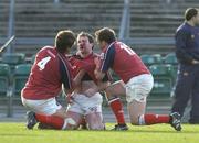 8 May 2005; John Kelly, Munster, is attended to by team-mates Donnacha O'Callaghan (4) and Rob Henderson after receiving a facial injury. Celtic Cup 2004-2005 Semi-Final, Leinster v Munster, Lansdowne Road, Dublin. Picture credit; Brendan Moran / SPORTSFILE