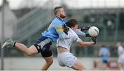 19 January 2014; Emmet Bolton, Kildare, in action against Andrew English, UCD. Bord na Mona O'Byrne Cup, Semi-Final, Kildare v UCD, St Conleth's Park, Newbridge, Co. Kildare. Picture credit: Dáire Brennan / SPORTSFILE