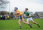 19 January 2014; Bobby Duggan, Clare, in action against Richie English, Limerick. Waterford Crystal Cup, Quarter-Final, Clare v Limerick. O'Garney Park, Sixmilebridge, Co. Clare. Picture credit: Stephen McCarthy / SPORTSFILE