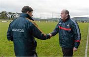 19 January 2014; Cork manager Brian Cuthbert, right, shakes hands with Kerry manager Eamonn Fitzmaurice after the game. McGrath Cup Final, Cork v Kerry, Mallow GAA Grounds, Mallow, Co. Cork. Picture credit: Brendan Moran / SPORTSFILE