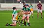 19 January 2014; Dan Kelleher, left, Offaly, passes the ball to team-mate Dermot Mooney. Bord Na Mona Walsh Cup, Quarter-Final, Offaly v Galway, O'Connor Park, Tullamore, Co. Offaly. Picture credit: Barry Cregg / SPORTSFILE