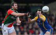 19 January 2014; Aidan O'Shea, Mayo, in action against Mark Nally, Roscommon. FBD League, Section A, Round 3, Roscommon v Mayo, Michael Glaveys GAA Club, Ballinlough, Co. Roscommon. Picture credit: David Maher / SPORTSFILE