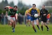 19 January 2014; Mark Nally, Roscommon, in action against Aidan O'Shea, Mayo. FBD League, Section A, Round 3, Roscommon v Mayo, Michael Glaveys GAA Club, Ballinlough, Co. Roscommon. Picture credit: David Maher / SPORTSFILE