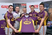 21 January 2014; Gain Feeds were today announced as the new sponsors of the Wexford GAA hurling and football teams. Pictured in attendance at the announcement are horse trainer Jim Bolger, centre, with Wexford hurlers, from left to right, Eanna Martin, Mark Fanning, Lee Chin and Paul Morris. Wexford Park, Wexford. Picture credit: Matt Browne / SPORTSFILE