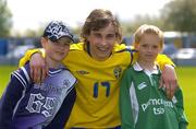 28 April 2005; Kevin Walker, Sweden, with his cousins Craig Kearns, left, age 8, and Luke Keogh, age 5, from Carlow. U16 Friendly International, Republic of Ireland U16 v Sweden U16, Whitehall, Dublin. Picture credit; Brian Lawless / SPORTSFILE
