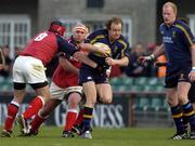 8 May 2005; Denis Hickie, Leinster, is tackled by Anthony Foley, left, and John Hayes, Munster. Celtic Cup 2004-2005 Semi-Final, Leinster v Munster, Lansdowne Road, Dublin. Picture credit; Brian Lawless / SPORTSFILE