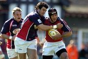 14 May 2005; Mike Mullins, Munster, is tackled by Mike Phillips, Llanelli Scarlets. Celtic Cup 2004-2005 Final, Munster v Llanelli Scarlets, Lansdowne Road, Dublin. Picture credit; Brendan Moran / SPORTSFILE