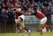 14 May 2005; Matthew Watkins, Llanelli Scarlets, is tackled by Mike Mullins, left, and Rob Henderson, Munster. Celtic Cup 2004-2005 Final, Munster v Llanelli Scarlets, Lansdowne Road, Dublin. Picture credit; Brendan Moran / SPORTSFILE