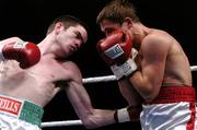 14 May 2005; Bernard Dunne, left, in action against Yuri Voronin. Brian Peters Promotions International Boxing, International Featherweight Bout, Bernard Dunne.v.Yuri Voronin, National Stadium, South Circular Road, Dublin. Picture credit; David Maher / SPORTSFILE