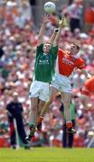 15 May 2005; James Sherry, Fermanagh, contests a high ball with John Toal, Armagh. Bank Of Ireland Ulster Senior Football Championship, Armagh v Fermanagh, St. Tighernach's Park, Clones, Co. Monaghan. Picture credit; Brendan Moran / SPORTSFILE