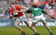 15 May 2005; Andrew McCann, Armagh, in action against James Sherry, Fermanagh. Bank Of Ireland Ulster Senior Football Championship, Armagh v Fermanagh, St. Tighernach's Park, Clones, Co. Monaghan. Picture credit; Brendan Moran / SPORTSFILE
