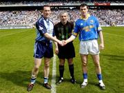 15 May 2005; Dublin captain Paddy Christie shakes hands with Longford captain Paul Barden in the presence of Referee Paddy Russell. Bank Of Ireland Leinster Senior Football Championship, Dublin v Longford, Croke Park, Dublin. Picture credit; Damien Eagers / SPORTSFILE