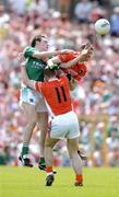 15 May 2005; John Toal and John McEntee (11), Armagh, contest a high ball with James Sherry, Fermanagh. Bank Of Ireland Ulster Senior Football Championship, Armagh v Fermanagh, St. Tighernach's Park, Clones, Co. Monaghan. Picture credit; Brendan Moran / SPORTSFILE