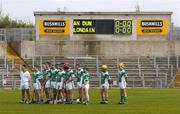 15 May 2005; The London team stand for the National anthem before the start of the match. Guinness Ulster Senior Hurling Championship, Down v London, Casement Park, Belfast. Picture credit; Brian Lawless / SPORTSFILE
