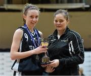22 January 2014; Megan O'Leary, St. Vincents captain, is presented with the cup by Louise O'Loughlin, Basketball Ireland. All-Ireland Schools Cup U19A Girls Final, Colaiste an Phiarsigh Gleann Maghair, Co. Cork v St Vincents, Co. Cork. National Basketball Arena, Tallaght, Co. Dublin. Picture credit: David Maher / SPORTSFILE