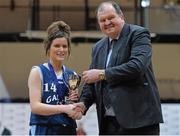 23 January 2014; Roisin Egan, Gallen CS Ferbane, is presented with the cup by Bernard O'Byrne, Chief Executive, Basketball Ireland. All-Ireland Schools Cup U16C Girls Final, Gallen CS Ferbane, Co. Offaly v St Josephs Charlestown, Co. Mayo, National Basketball Arena, Tallaght, Co. Dublin. Picture credit: Ramsey Cardy / SPORTSFILE