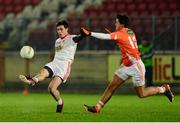 15 January 2014; Shay McGuigan, Tyrone, in action against Stefan Campbell, Armagh. Power NI Dr. McKenna Cup, Section A, Round 3, Tyrone v Armagh, Healy Park, Omagh, Co. Tyrone. Picture credit: Oliver McVeigh / SPORTSFILE