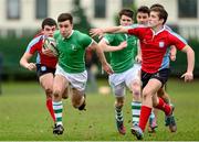 23 January 2014; Roddy Fitzpatrick, Gonzaga College, is tackled by Stephen Tarpey, left, and James O'Kane, right, C.U.S. Vinnie Murray Semi-Final, C.U.S v Gonzaga College, Sydney Parade, Co. Dublin. Picture credit: Barry Cregg / SPORTSFILE