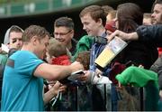 24 January 2014; Ireland's Jamie Heaslip signs autographs for supporters after squad training ahead of their opening RBS Six Nations Rugby Championship game against Scotland on Sunday the 2nd of February. Ireland Rugby Squad Training, Aviva Stadium, Lansdowne Road, Dublin. Picture credit: Matt Browne / SPORTSFILE
