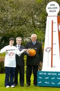 16 May 2005; An Taoiseach Bertie Ahern TD, with Special Olympics athlete Anne Foley, from Abbeyleix and the face of the GO! TV ad, and Dr. Philip Nolan, Chief Executive, eircom, pictured at the launch of the Million Miles for one of those Smiles appeal, the final phase of the Special Olympics Ireland GO! campaign fundraising drive, sponsored by eircom. Visit www.go2005.ie or call 1850 60 2005 (RoI) / 0800 404 9631(NI) to register your fundraising event which will help recruit new Special Olympics athletes in your county. Merrion Square, Dublin. Picture credit; Brendan Moran / SPORTSFILE