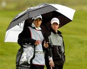 20 May 2005; Ireland's Rory McIlroy, with his caddy Harry Diamond, pictured on the 11th green during the second round of the Nissan Irish Open Golf Championship. Carton House Golf Club, Maynooth, Co. Kildare. Picture credit; Matt Browne / SPORTSFILE