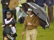 20 May 2005; Darren Clarke pictured with his caddy Billy Foster on the 3rd green during the second round of the Nissan Irish Open Golf Championship. Carton House Golf Club, Maynooth, Co. Kildare. Picture credit; Matt Browne / SPORTSFILE
