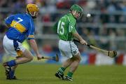 21 May 2005; Donnacha Sheehan, Limerick, in action against Eamonn Corcoran, Tipperary. Guinness Munster Senior Hurling Championship Quarter-Final Replay, Limerick v Tipperary, Gaelic Grounds, Limerick. Picture credit; Brendan Moran / SPORTSFILE