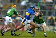 21 May 2005; Benny Dunne, Tipperary, in action against Paul O'Grady, left, and Conor Fitzgerald, Limerick. Guinness Munster Senior Hurling Championship Quarter-Final Replay, Limerick v Tipperary, Gaelic Grounds, Limerick. Picture credit; Brendan Moran / SPORTSFILE
