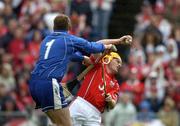 22 May 2005; Joe Deane, Cork, is tackled by Waterford 'keeper Stephen Brenner. Guinness Munster Senior Hurling Championship Semi-Final, Cork v Waterford, Semple Stadium, Thurles, Co. Tipperary. Picture credit; Ray McManus / SPORTSFILE