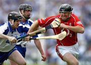 22 May 2005; Brian Corcoran, Cork, in action against Fergal Hartley, left, and Tony Browne, Waterford. Guinness Munster Senior Hurling Championship Semi-Final, Cork v Waterford, Semple Stadium, Thurles, Co. Tipperary. Picture credit; Brendan Moran / SPORTSFILE