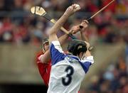 22 May 2005; Fergal Hartley, Waterford, wins possession from Brian Corcoran, Cork, in the first few minutes of the game. Guinness Munster Senior Hurling Championship Semi-Final, Cork v Waterford, Semple Stadium, Thurles, Co. Tipperary. Picture credit; Ray McManus / SPORTSFILE