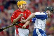 22 May 2005; Joe Deane, Cork, is tackled by Fergal Hartley, Waterford. Guinness Munster Senior Hurling Championship Semi-Final, Cork v Waterford, Semple Stadium, Thurles, Co. Tipperary. Picture credit; Ray McManus / SPORTSFILE