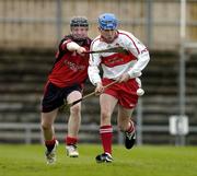 22 May 2005; Rian Kealey, Derry, in action against Michael Gilmore, Down. Ulster Minor Hurling Championship Semi-Final, Derry v Down, Casement Park, Belfast. Picture credit; Pat Murphy / SPORTSFILE