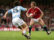 23 May 2005; Dennis Hickie, British and Irish Lions, in action against Bernado Stortoni, Argentina. Zurich Test, British and Irish Lions v Argentina, Millennium Stadium, Cardiff. Picture Credit; Tim Parfitt / SPORTSFILE