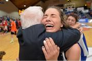 25 January 2014; Hayley Lenihan, Team Boardwalk Bar & Grill Glanmire, celebrates with team chairman Sean O'Sullivan after the game. Basketball Ireland Women's U18 National Cup Final, Singleton SuperValu Brunell, Cork v Team Boardwalk Bar & Grill Glanmire, Cork. National Basketball Arena, Tallaght, Co. Dublin. Photo by Sportsfile