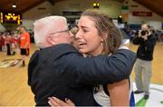 25 January 2014; Hayley Lenihan, Team Boardwalk Bar & Grill Glanmire, celebrates with team chairman Sean O'Sullivan after the game. Basketball Ireland Women's U18 National Cup Final, Singleton SuperValu Brunell, Cork v Team Boardwalk Bar & Grill Glanmire, Cork. National Basketball Arena, Tallaght, Co. Dublin. Photo by Sportsfile