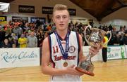 25 January 2014; Templeogue captain Sean Flood with the cup after the game. Basketball Ireland Men's U18 National Cup Final, Letterkenny Blaze, Donegal v Templeogue, Dublin. National Basketball Arena, Tallaght, Co. Dublin. Photo by Sportsfile