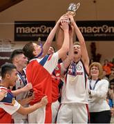 25 January 2014; Templeogue captain Sean Flood, right, lifts the cup. Basketball Ireland Men's U18 National Cup Final, Letterkenny Blaze, Donegal v Templeogue, Dublin. National Basketball Arena, Tallaght, Co. Dublin. Photo by Sportsfile