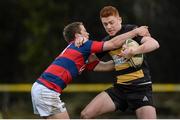 25 January 2014; Derry O'Connor, Young Munster, is tackled by Max McFarland, Clontarf. Ulster Bank League, Division 1A, Young Munster v Clontarf, Tom Clifford Park, Limerick. Picture credit: Diarmuid Greene / SPORTSFILE