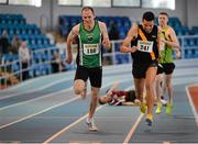 25 January 2014; Tim Shiels, left, Derry City Track Club A.C., Co. Derry, crosses the finishline ahead of Mounir Bouziane, right, Clonliffe Harriers A.C. to win the M1 Mens 800m race during in the Woodie’s DIY Master Indoor Championships of Ireland. Athlone Institute of Technology Arena, Athlone, Co. Westmeath. Picture credit: Barry Cregg / SPORTSFILE