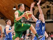 24 January 2014; Mazvydas Cepliauskas, Dublin Inter, in action against Kyle Hosford, left, and Colin O'Reilly, C&S UCC Demons. Basketball Ireland National Men's Senior Cup Final, C&S UCC Demons, Cork v Dublin Inter, National Basketball Arena, Tallaght, Co. Dublin. Picture credit: Brendan Moran / SPORTSFILE