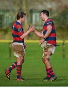 25 January 2014; Clontarf's Brendan Cutriss, left, and Mick Kearney celebrate after victory over Young Munster. Ulster Bank League, Division 1A, Young Munster v Clontarf, Tom Clifford Park, Limerick. Picture credit: Diarmuid Greene / SPORTSFILE