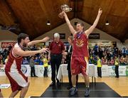 25 January 2014; JM&L Auctioneers Titans captain Paulius Peldzius celebrates with the cup after the game. Basketball Ireland Men's National Shield Final, JM&L Auctioneers Titans, Galway v Team Left Bank Kilkenny. National Basketball Arena, Tallaght, Co. Dublin. Photo by Sportsfile