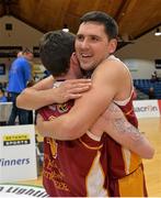 25 January 2014; Gintaras Sedebskis, right, JM&L Auctioneers Titans, celebrates with team-mate Emmet Murphy after the game. Basketball Ireland Men's National Shield Final, JM&L Auctioneers Titans, Galway v Team Left Bank Kilkenny. National Basketball Arena, Tallaght, Co. Dublin. Photo by Sportsfile