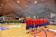 24 January 2014; The C&S UCC Demons and Dublin Inter teams stand for the National Anthem before the game. Basketball Ireland National Men's Senior Cup Final, C&S UCC Demons, Cork v Dublin Inter, National Basketball Arena, Tallaght, Co. Dublin. Picture credit: Brendan Moran / SPORTSFILE