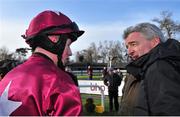 26 January 2014; Jockey Byan Cooper speaking with owner Michael O'Leary after he rode Trifolium to win The Frank Ward Solicitors Arkle Novice Steeplechase. Leopardstown Racecourse, Leopardstown, Co. Dublin. Picture credit: Barry Cregg / SPORTSFILE